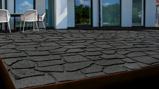 Black interlocking rubber pavers back patio