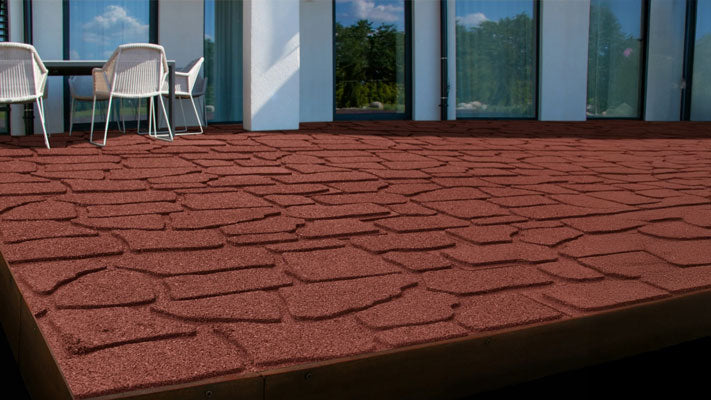red rubber patio pavers installed outside