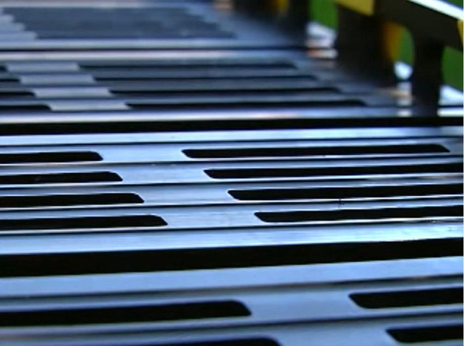 Metal ramp slotted tread roll a ramp