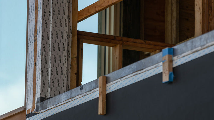 Siga Wigluv vapor permeable polyolefin film installed on window frame