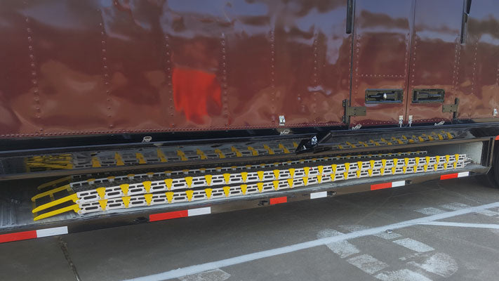 storing 14 foot long band trailer ramp Roll A Ramp