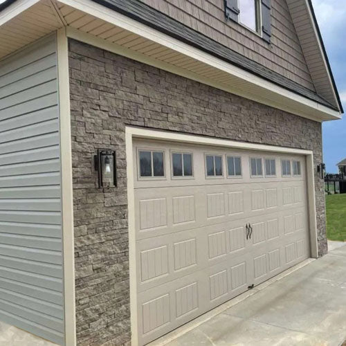 exterior residential house stone panel siding evolve stone morning aspen color gray 