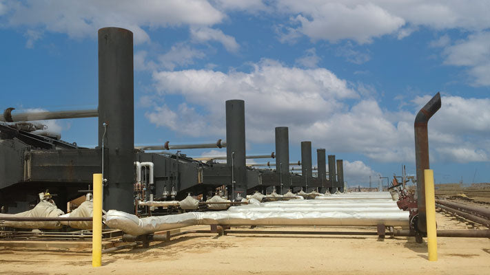 Oil extraction equipment insulated with Carboline's Thermaline Heat Shield coating