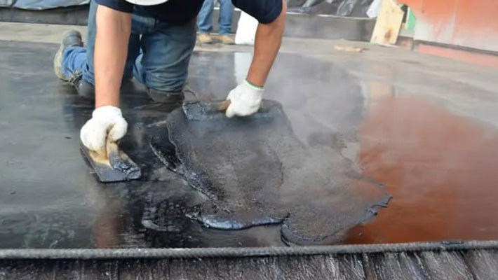 Bitumastic coating hand applied Carboline