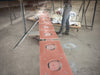 Carboweld 11 being spray applied to steel plates 