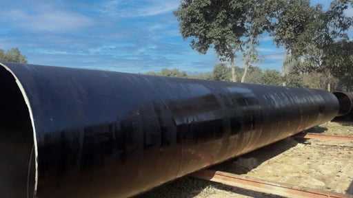 Carboline Mastic 50 tar painting on pipe 