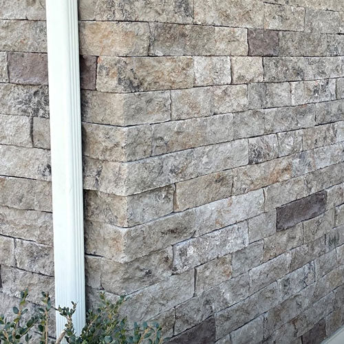 Evolve Stone Mortarless Siding Morning Aspen color corners on exterior house