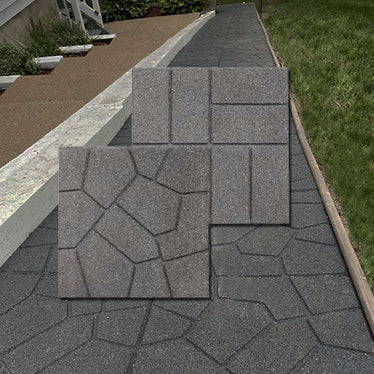 gray rubber paver, pavers over grass in backyard