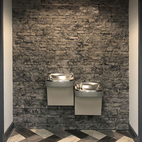 mortarless stone veneer evolve stone product by water fountain accent wall capital sky phantom shadow color