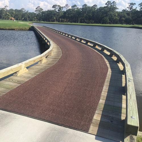 brown non-slip matting on golf course bridge