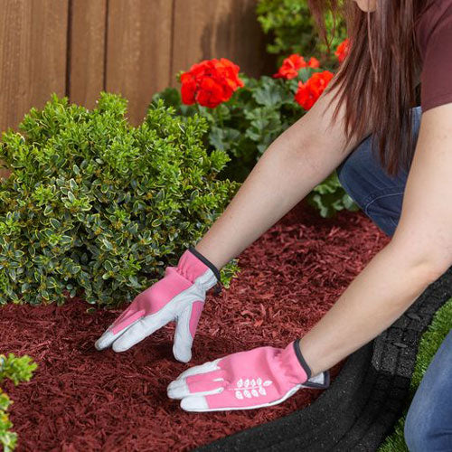Red Shredded Rubber Mulch in planter flower beds