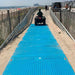 blue beach access mat over sand accessdeck