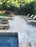 tan colored pool deck mat around residential house pool