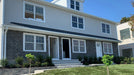 faux stone cladding on house Evolve Stone Georgetown Run Phantom Shadow Color gray siding